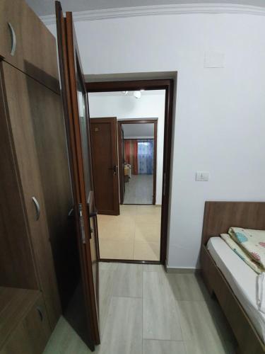 a room with a door open to a bedroom at Casa Roua in Venus