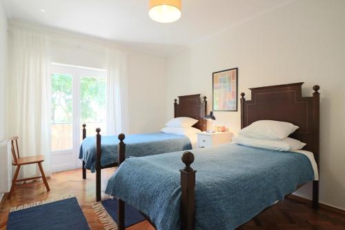 Кровать или кровати в номере Apartamento de charme