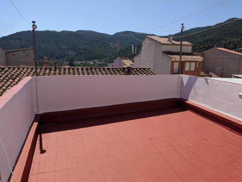 a white wall on top of a roof at Casa Rural Adriana, Montanejos in Montanejos
