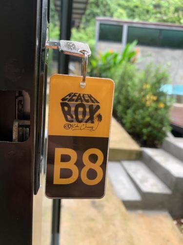 a key tag on a door of a house at BeachBox@Koh Сhang in Ko Chang