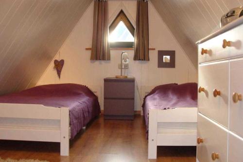 Postel nebo postele na pokoji v ubytování Ferienhaus _Deichkind_