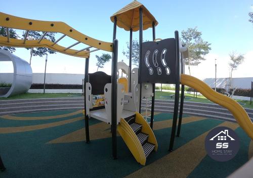 a playground with a slide in a park at KULAI HOME STAY @IOI MALL/JPO/AEON/SENAI AIRPORT in Kulai