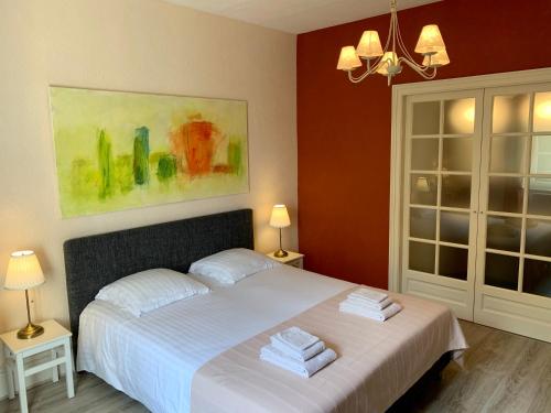 Ένα ή περισσότερα κρεβάτια σε δωμάτιο στο Villa St. Hubert