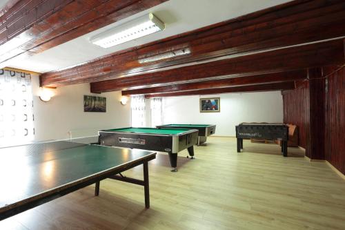 a room with two ping pong tables in it at Hotel Panorama in Panichishte
