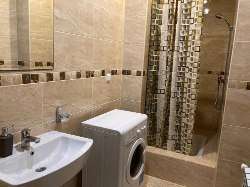Ένα μπάνιο στο Apartment close to Roshen fountain