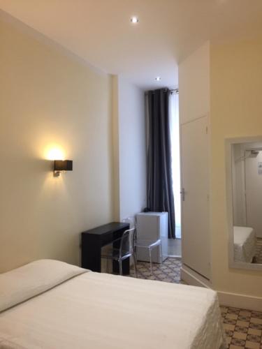 Postel nebo postele na pokoji v ubytování Hotel Cresp