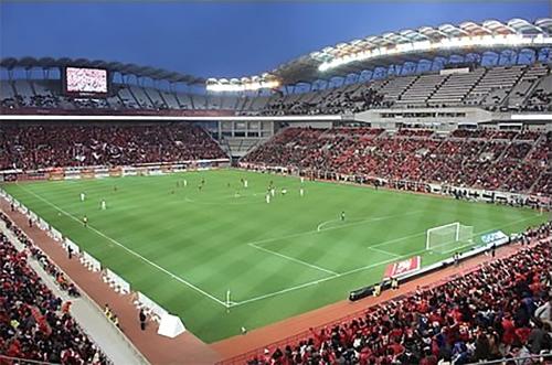 a stadium filled with people watching a soccer game at Tabino Hotel Kashima in Kamisu