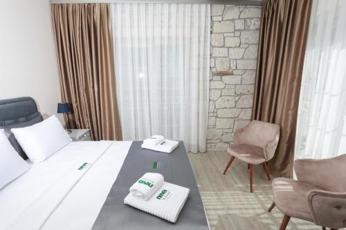 Μια τηλεόραση ή/και κέντρο ψυχαγωγίας στο Neva Hotel Alaçatı