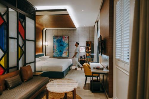 Ένα ή περισσότερα κρεβάτια σε δωμάτιο στο Andaz Dubai The Palm, By Hyatt