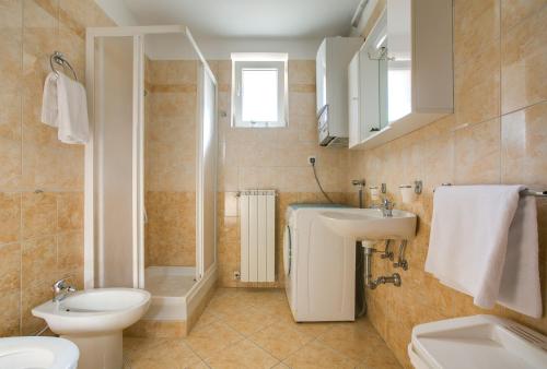Ванная комната в Apartments Gracijela