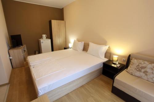 Postel nebo postele na pokoji v ubytování MESSEMBRIA RESORT