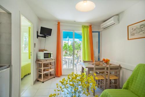 TV a/nebo společenská místnost v ubytování Residence Motel Corsicana