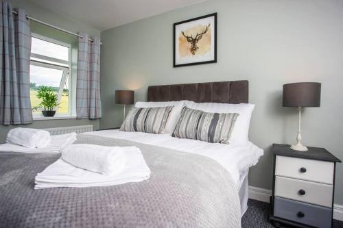 En eller flere senge i et værelse på Canney Hill View Bishop Auckland