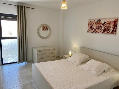 Postel nebo postele na pokoji v ubytování Ocean View Apartament