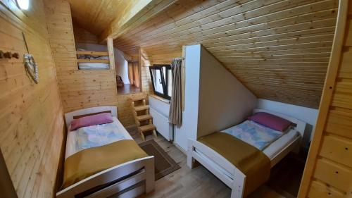 Postel nebo postele na pokoji v ubytování Casa de vacanta Two Brothers Concept