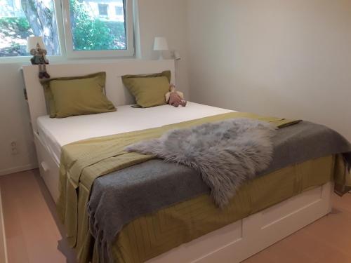 เตียงในห้องที่ Terrasses de Malmedy - Duplex 419