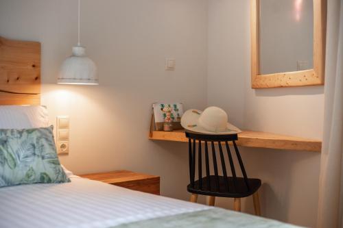 A bed or beds in a room at Dimoulias House