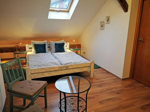 Cama ou camas em um quarto em Guest House Relić