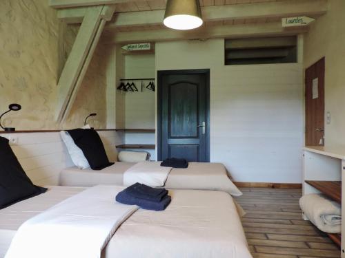 Cama o camas de una habitación en Les 5 Petits Lapins