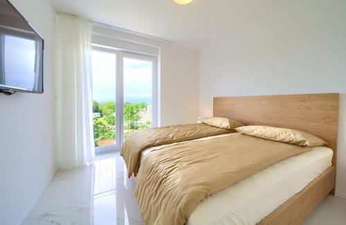 Ein Bett oder Betten in einem Zimmer der Unterkunft Villa Rossa