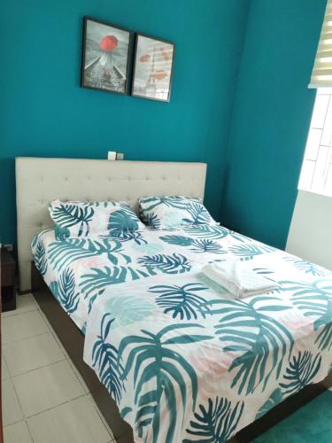 En eller flere senge i et værelse på Ayedoun