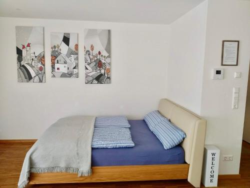 Postel nebo postele na pokoji v ubytování Apartments Alice & Julia