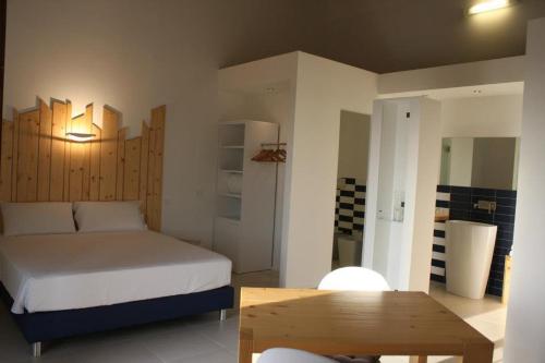 Postel nebo postele na pokoji v ubytování Cantina Loft