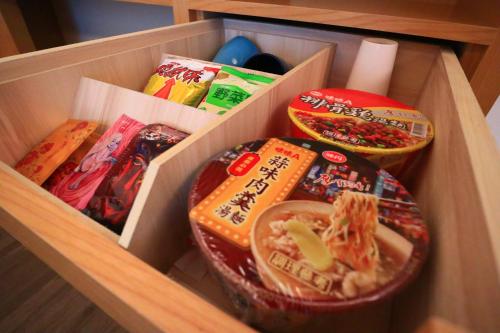 a box filled with different types of food at Shu Xin Motel in Nantou City