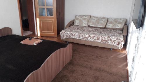 Apartment on Mira 15 tesisinde bir odada yatak veya yataklar