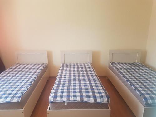 Una cama o camas en una habitación de Guest House Luka