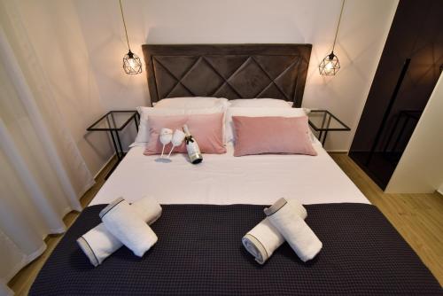 Voodi või voodid majutusasutuse Luxury Apartments La Perla toas