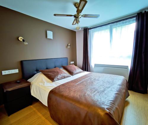 Postel nebo postele na pokoji v ubytování Appart Hotel Relax Spa