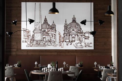 a drawing of a building on the wall of a restaurant at Acanthus Cennet Barut Collection - Ultra All Inclusive in Side