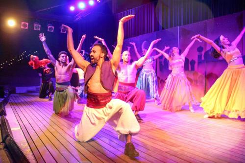 a group of people dancing on a dance floor at Cambrils Park Family Resort in Cambrils