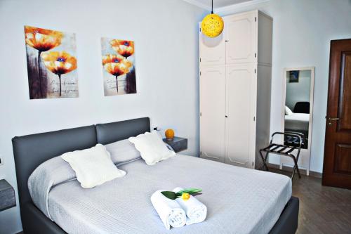 Postel nebo postele na pokoji v ubytování Mura Home Sorrento