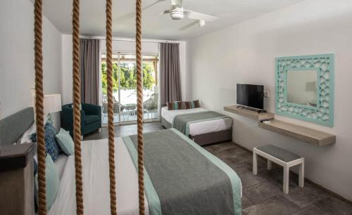 Postel nebo postele na pokoji v ubytování La Mariposa Mauritius