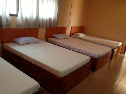 Кровать или кровати в номере Grand View Guesthouse