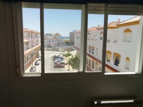 a view from a window of a parking lot at Atico en Zahara de los Atunes con Wifi in Zahara de los Atunes