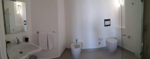 A bathroom at Athena Charming Rooms