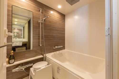 Ένα μπάνιο στο Meitetsu Inn Shinosakaeki Higashiguchi