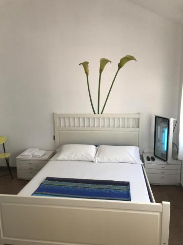 Postel nebo postele na pokoji v ubytování Villa olivella