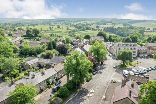 an aerial view of a town with a street at Isaac's Cottage in Hexham