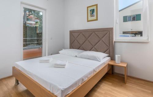 Postel nebo postele na pokoji v ubytování Apartment Raul in Dajla