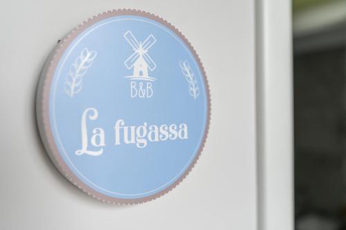 a sign for a bbb la fiscosa at B&B Il Granaio Celeste in Porto Viro
