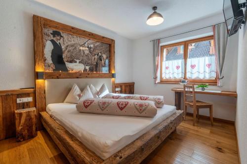Кровать или кровати в номере Weliserhof