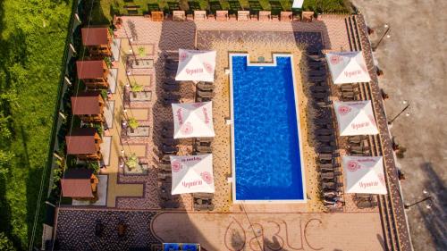 an overhead view of a swimming pool in a resort at Оазис in Zalishchyky
