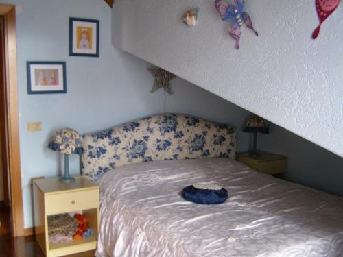 Postel nebo postele na pokoji v ubytování Chalet Orchidea