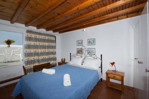 A bed or beds in a room at Sunday Summer House