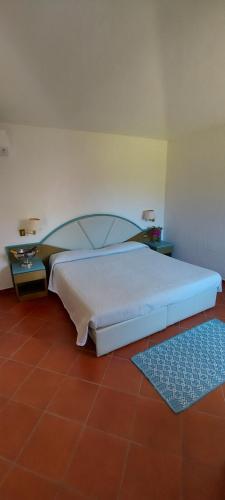 Postel nebo postele na pokoji v ubytování Hotel Pinocchio