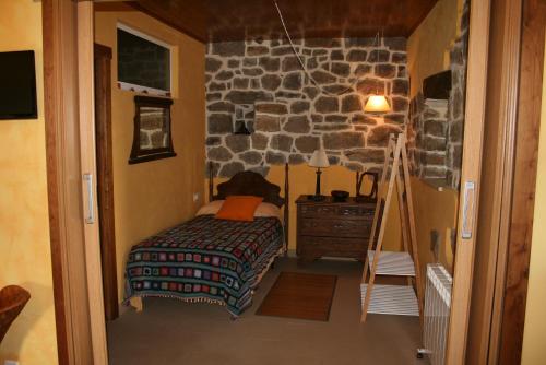 A bed or beds in a room at Cueva Reximan